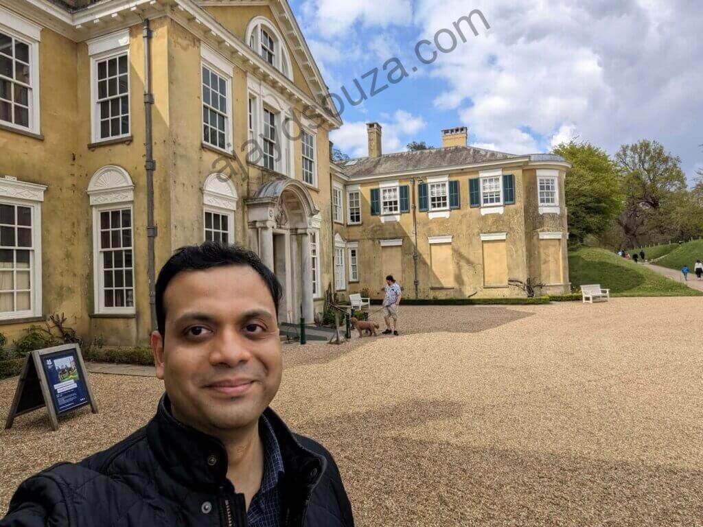 Ajay with the Polesden Lacey House in the background