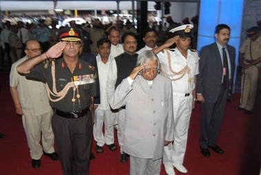 President A.P.J. Abdul Kalam stands in salute at Mahim Station - Photo courtesy Reuteurs